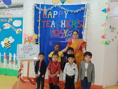 A Prep teacher with her class celebrating Teacher’s Day
