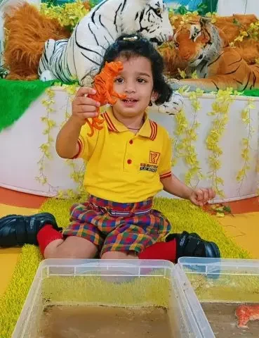 Nursery class children engaged in early education activities